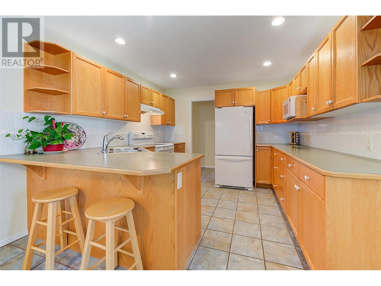 1051 Chilcotin Crescent, Kelowna, British Columbia  V1V 2L7 - Photo 11 - 10346542