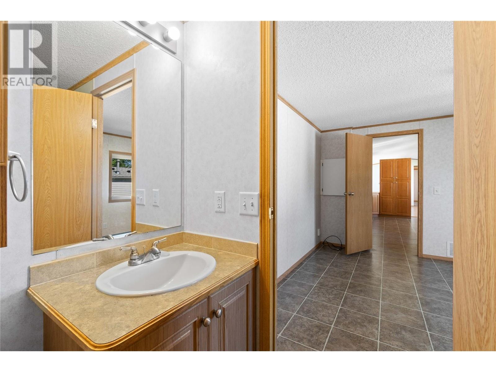 3350 10th Avenue Ne Unit# 54, Salmon Arm, British Columbia  V1E 1J6 - Photo 25 - 10346582
