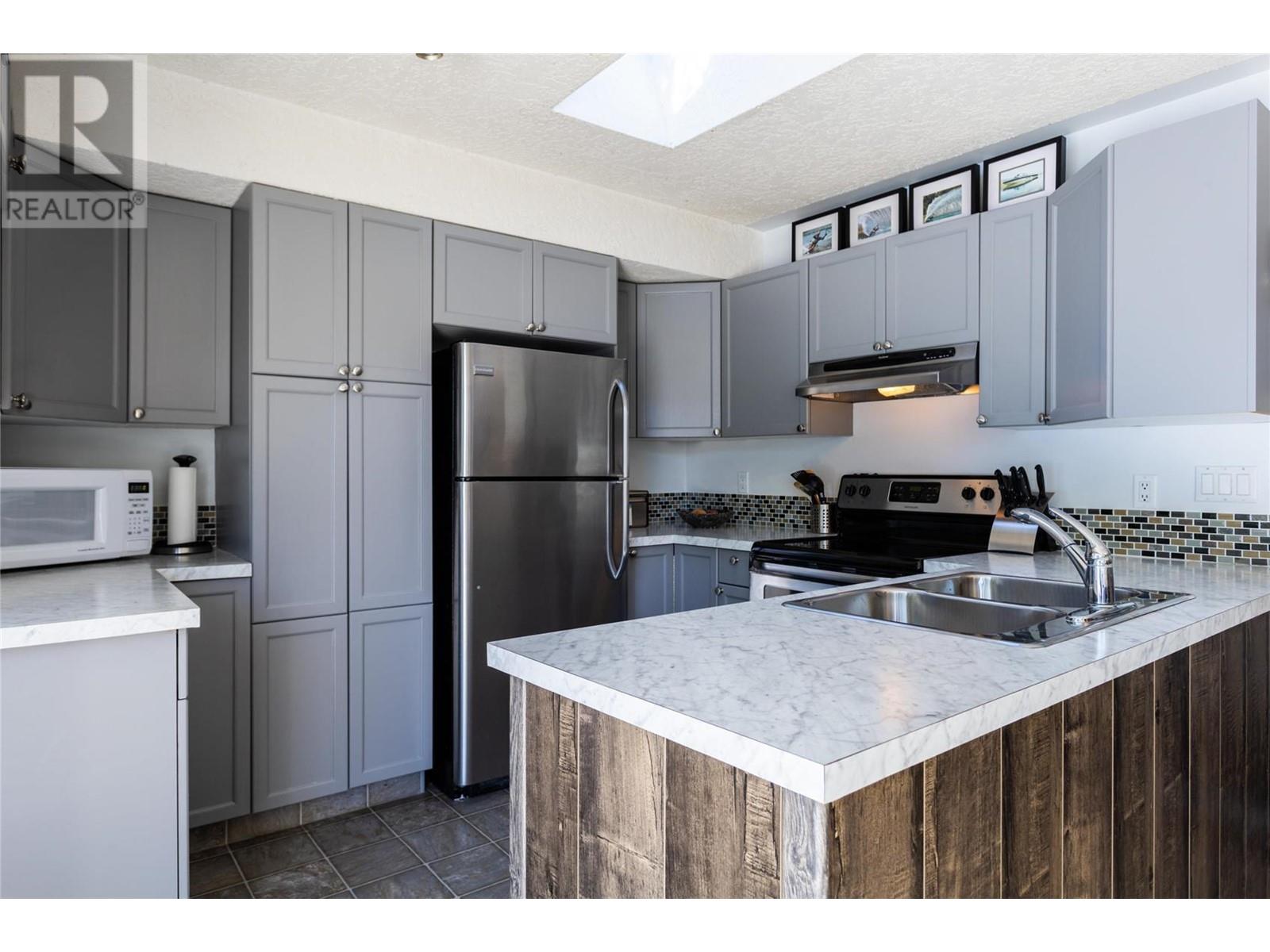 7841 97 Highway Unit# 48, Kelowna, British Columbia  V4V 1E7 - Photo 2 - 10345632