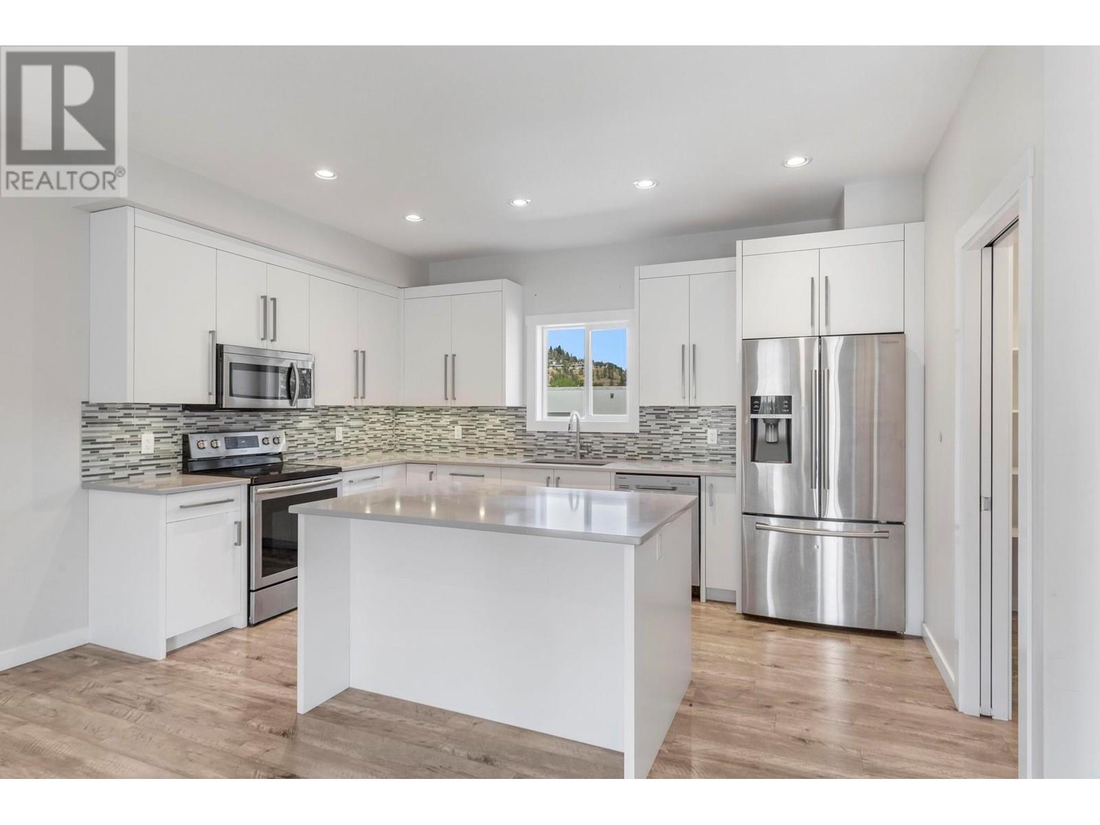 140 Mills Road Unit# 2, Kelowna, British Columbia  V1V 1V1 - Photo 1 - 10351266