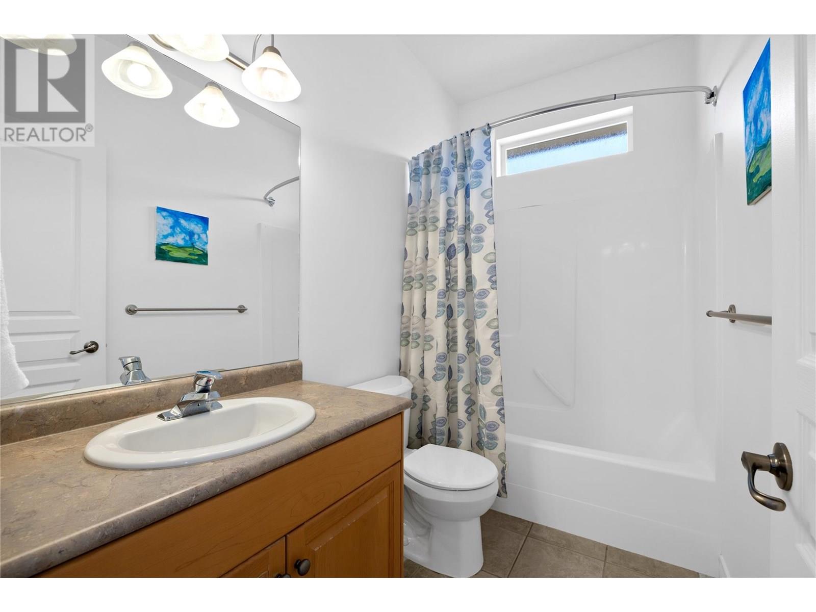 1950 Capistrano Drive Unit# 103, Kelowna, British Columbia  V1V 2N7 - Photo 17 - 10352134