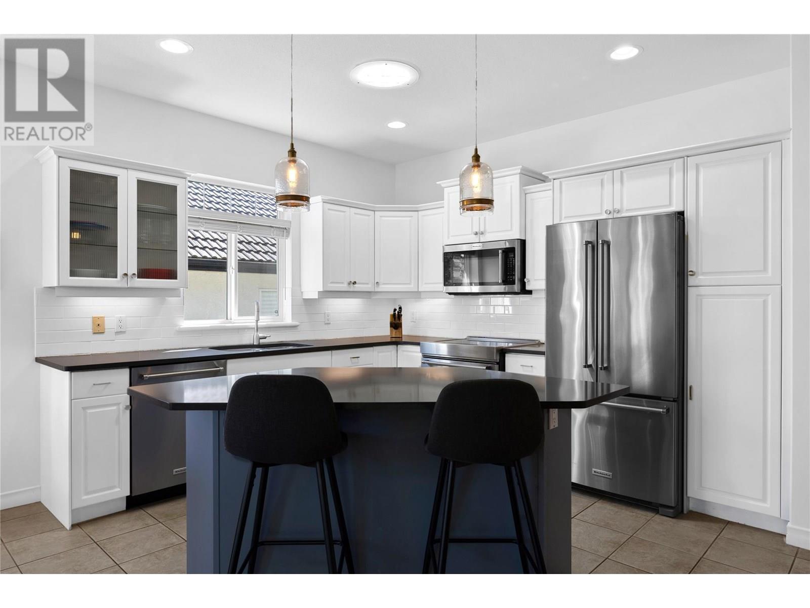 1950 Capistrano Drive Unit# 103, Kelowna, British Columbia  V1V 2N7 - Photo 24 - 10352134
