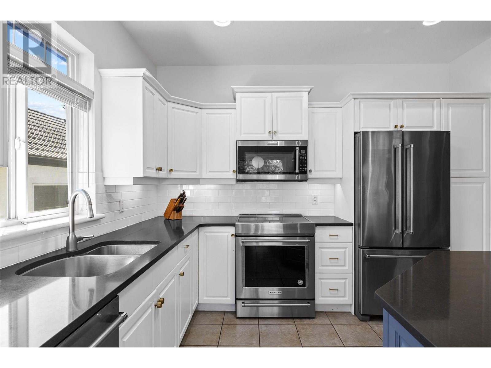 1950 Capistrano Drive Unit# 103, Kelowna, British Columbia  V1V 2N7 - Photo 25 - 10352134