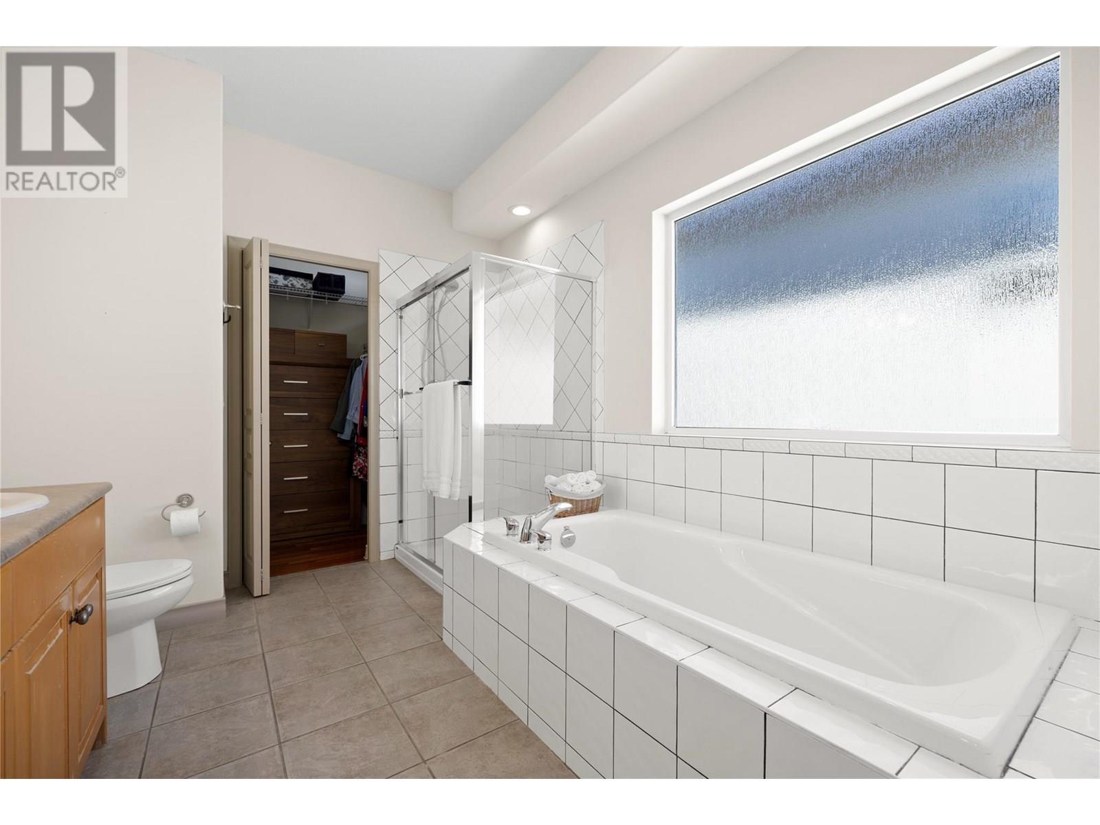 1950 Capistrano Drive Unit# 103, Kelowna, British Columbia  V1V 2N7 - Photo 38 - 10352134