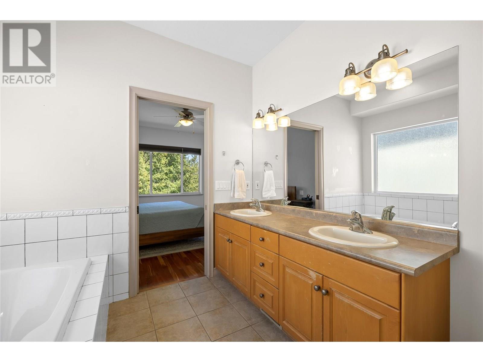 1950 Capistrano Drive Unit# 103, Kelowna, British Columbia  V1V 2N7 - Photo 39 - 10352134