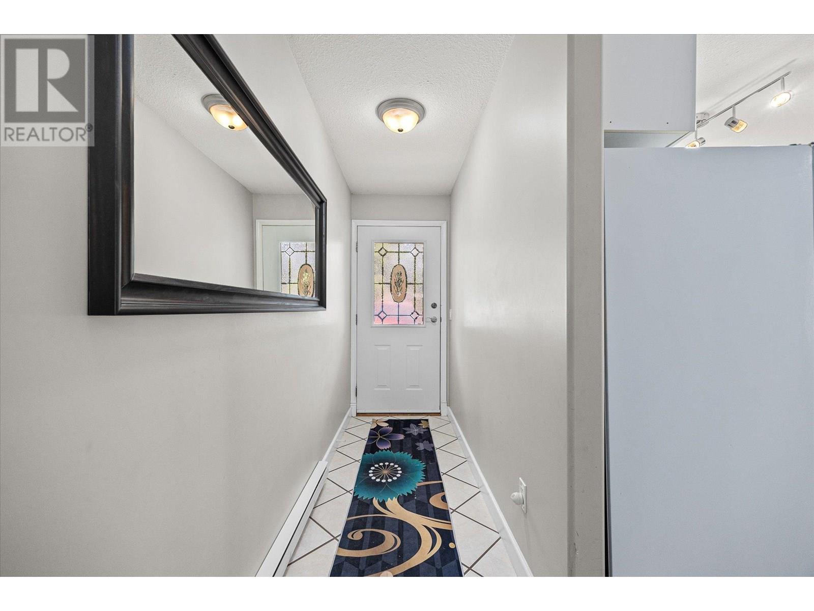 1404 Inkar Road, Kelowna, British Columbia  V1Y 8H7 - Photo 4 - 10351939