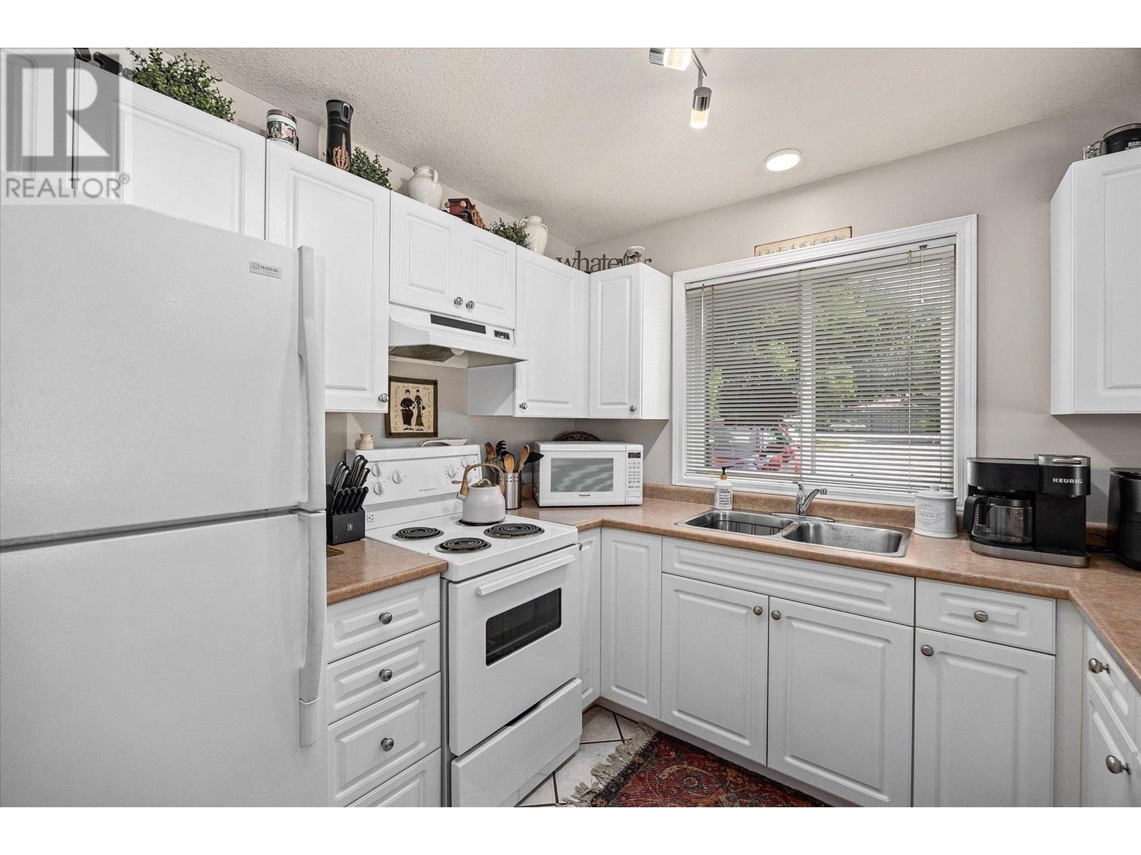 1404 Inkar Road, Kelowna, British Columbia  V1Y 8H7 - Photo 6 - 10351939