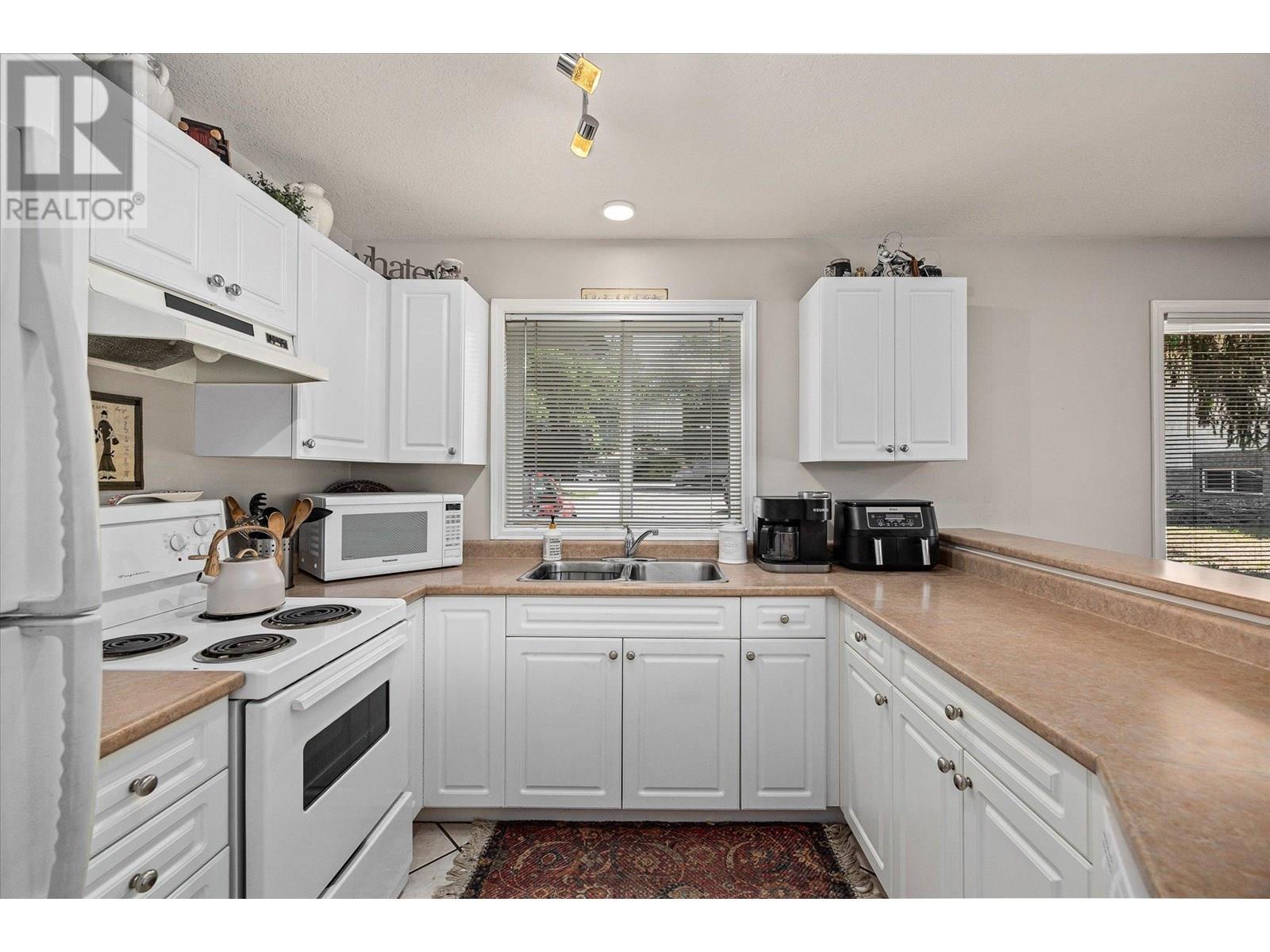 1404 Inkar Road, Kelowna, British Columbia  V1Y 8H7 - Photo 7 - 10351939