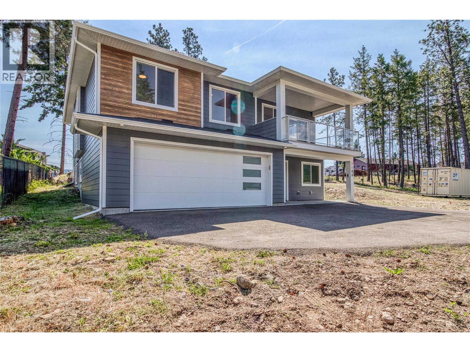 7186 Dunwaters Road, Kelowna, British Columbia  V1Z 3W5 - Photo 1 - 10362558