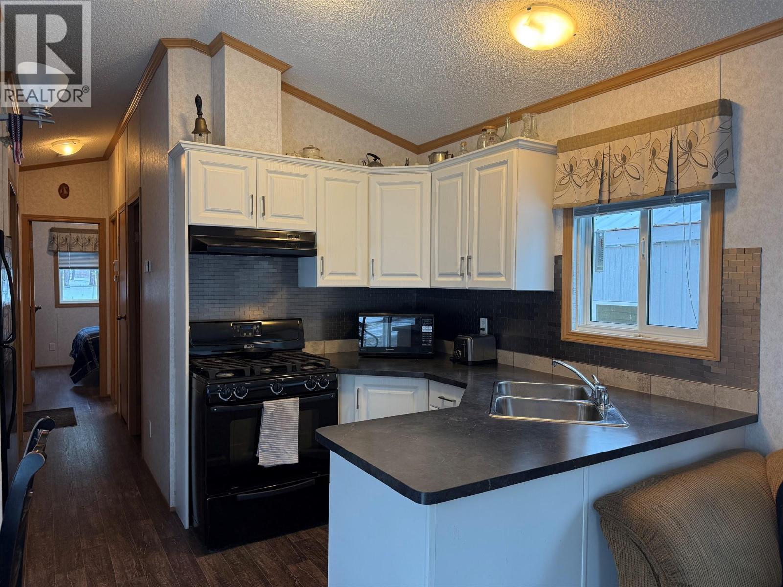 2955 33 Highway, Westbridge, British Columbia  V0H 1Y0 - Photo 9 - 10371111