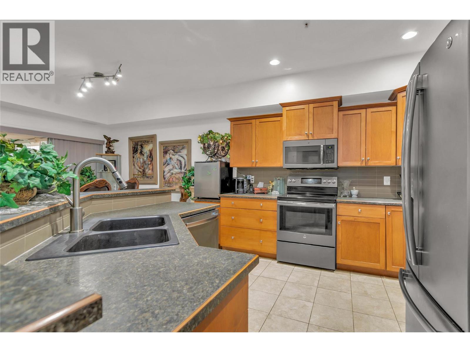 1961 Durnin Road Unit# 104, Kelowna, British Columbia  V1X 7Z6 - Photo 3 - 10372755
