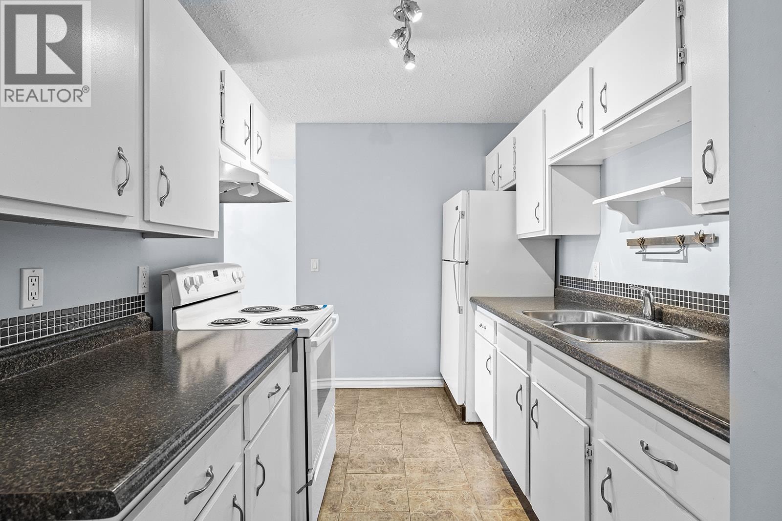 625 Rowcliffe Avenue Unit# 203, Kelowna, British Columbia  V1Y 5Y8 - Photo 11 - 10373044