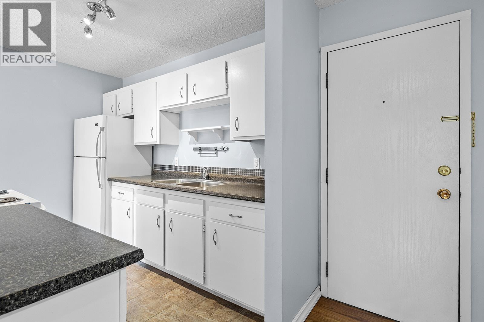 625 Rowcliffe Avenue Unit# 203, Kelowna, British Columbia  V1Y 5Y8 - Photo 12 - 10373044