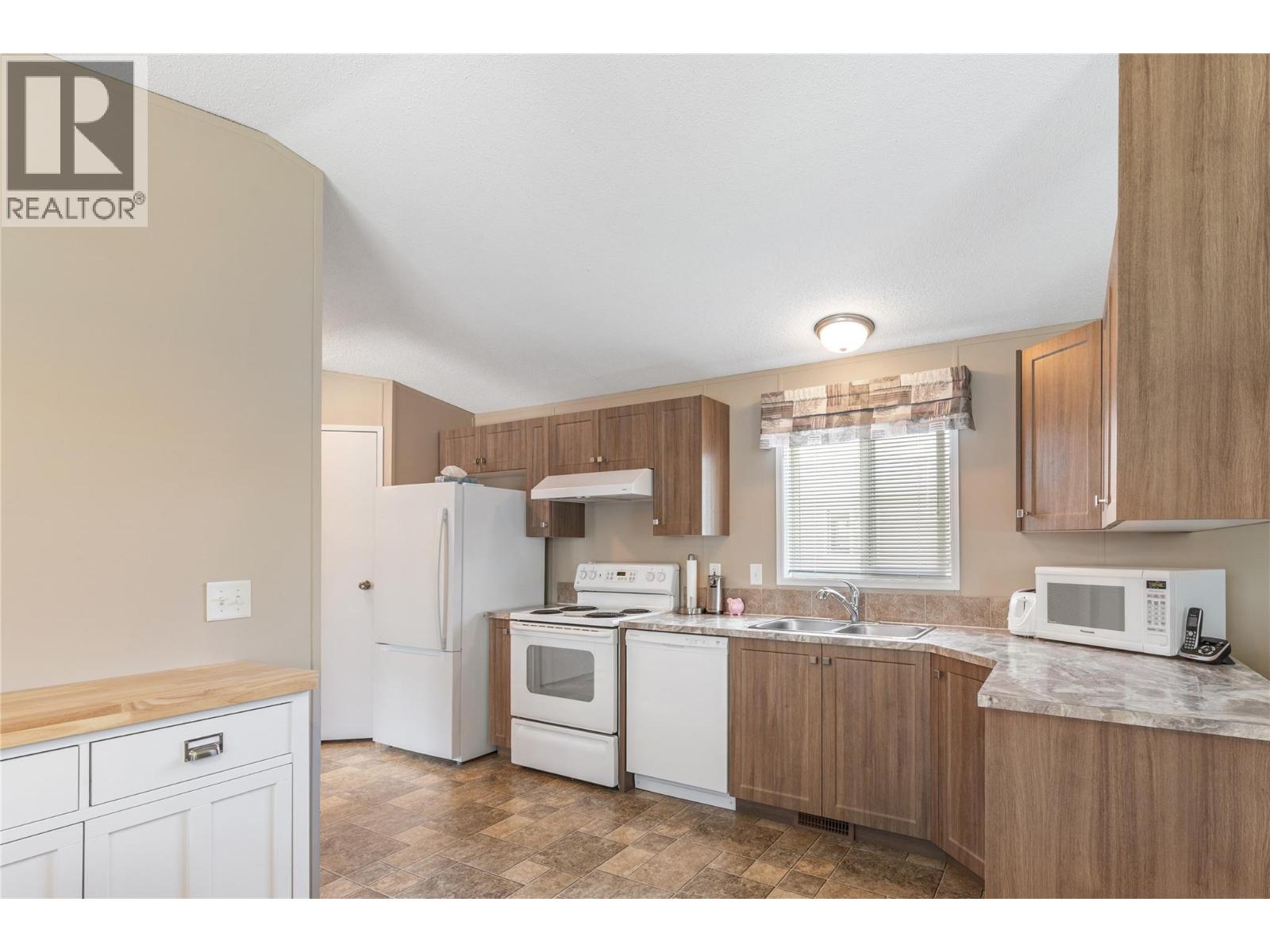 12560 Westside Road Unit# 74, Vernon, British Columbia  V1H 1S9 - Photo 2 - 10372915