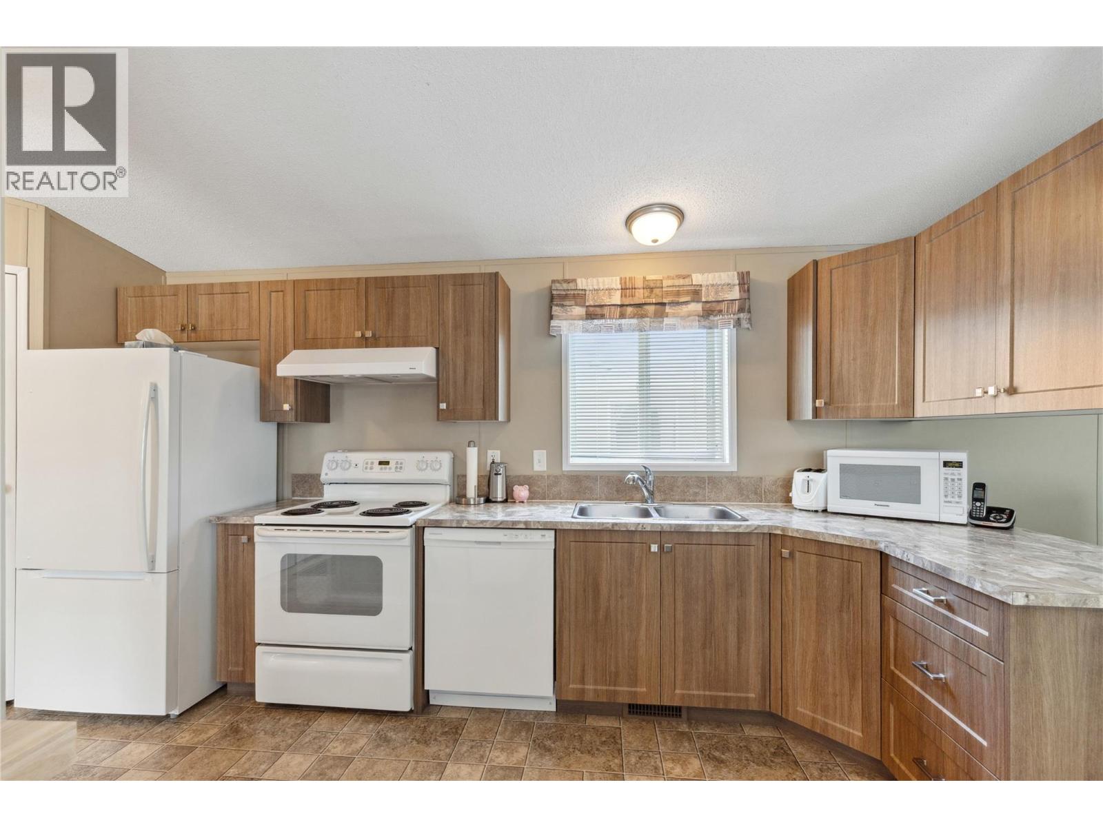 12560 Westside Road Unit# 74, Vernon, British Columbia  V1H 1S9 - Photo 4 - 10372915