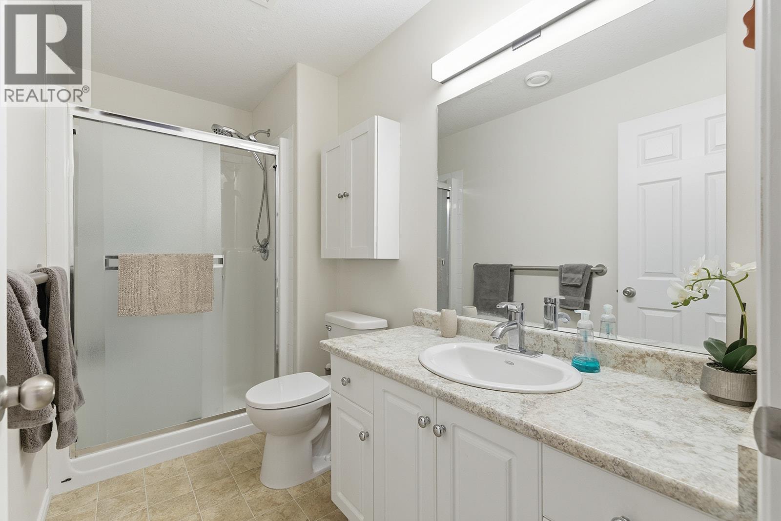 1966 Durnin Road Unit# 406, Kelowna, British Columbia  V1X 7Z2 - Photo 30 - 10375421