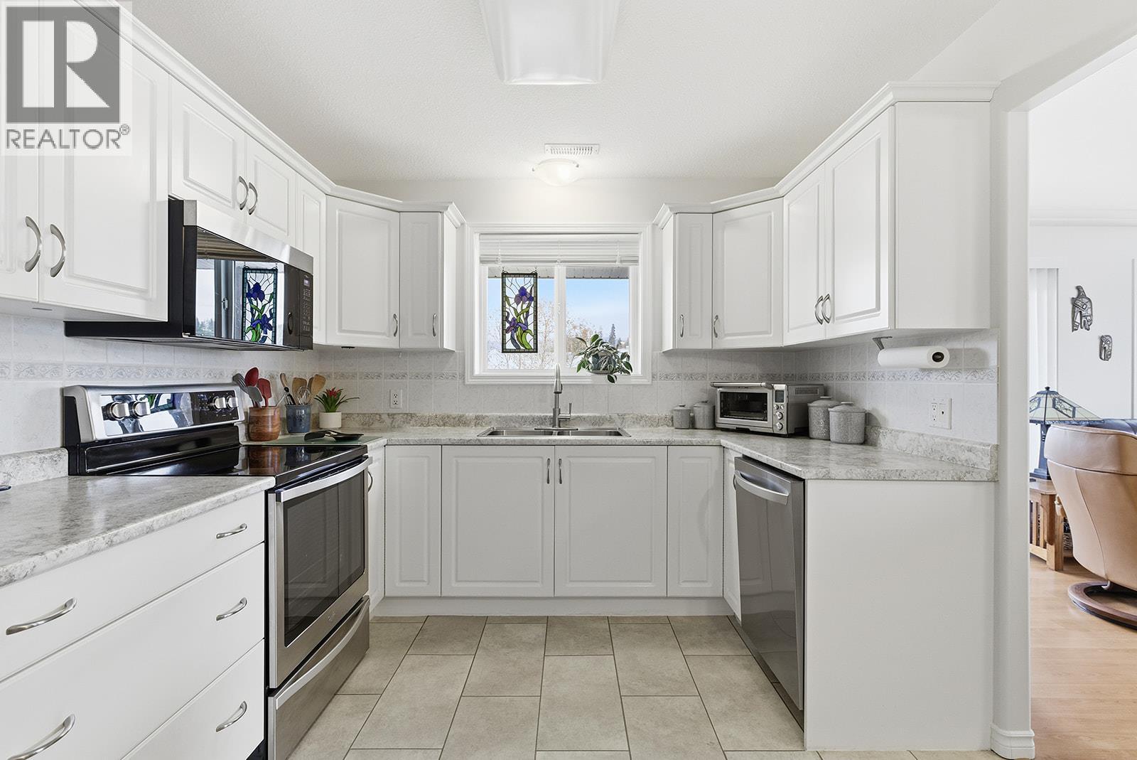 1966 Durnin Road Unit# 406, Kelowna, British Columbia  V1X 7Z2 - Photo 5 - 10375421