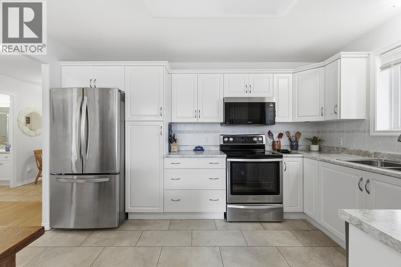 1966 Durnin Road Unit# 406, Kelowna, British Columbia  V1X 7Z2 - Photo 6 - 10375421