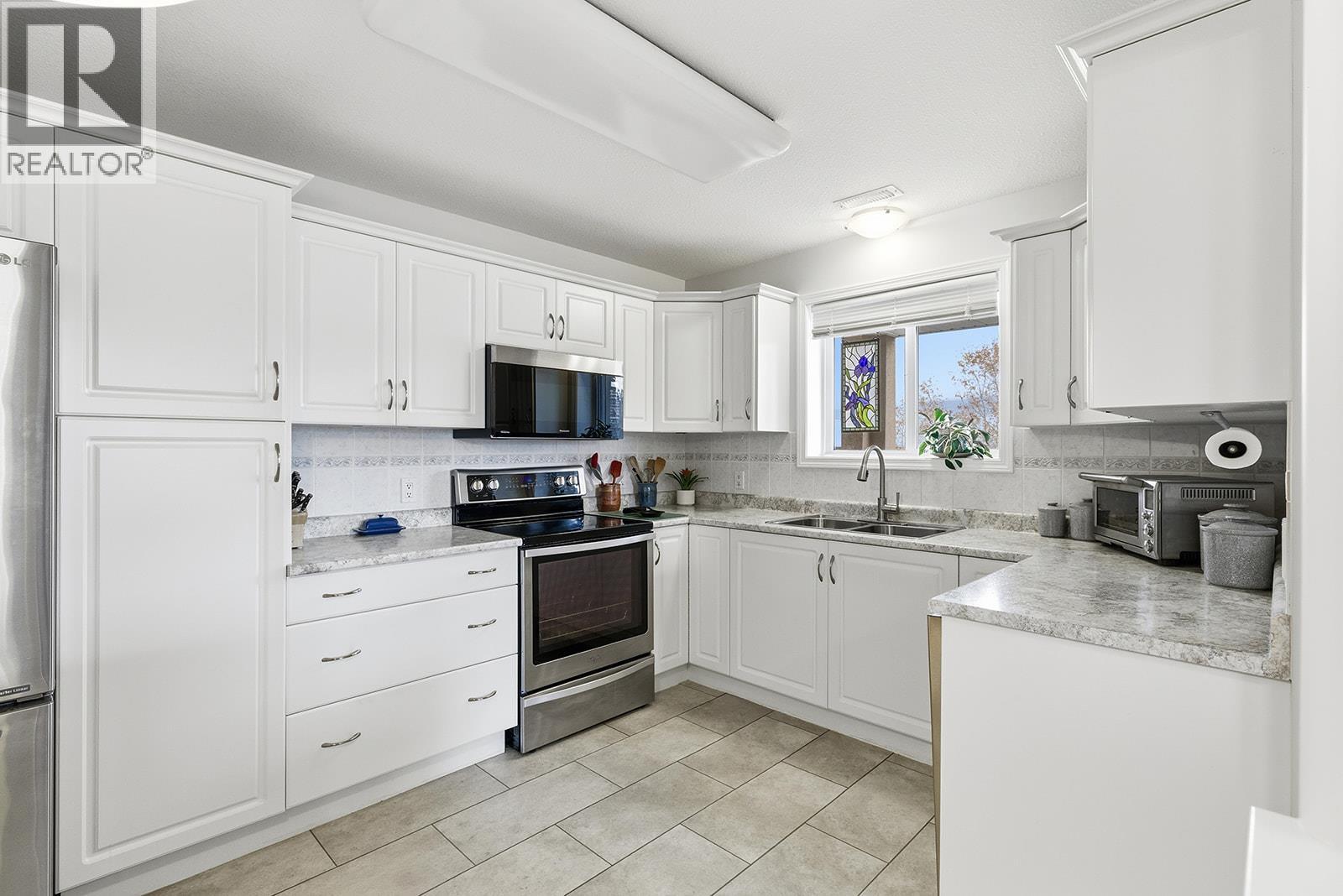 1966 Durnin Road Unit# 406, Kelowna, British Columbia  V1X 7Z2 - Photo 7 - 10375421