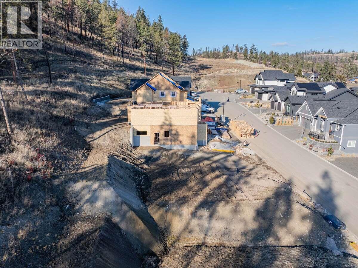 1432 Whistling Pine Place, Kelowna, British Columbia  V1V 0J3 - Photo 4 - 10375916