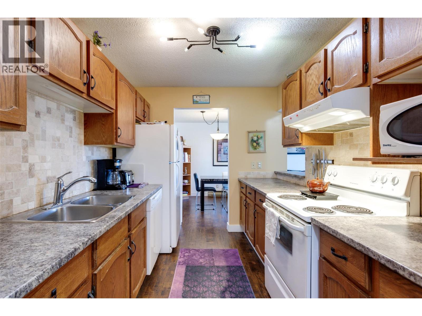 1490b Gordon Drive Unit# 206, Kelowna, British Columbia  V1Y 3G7 - Photo 3 - 10378017