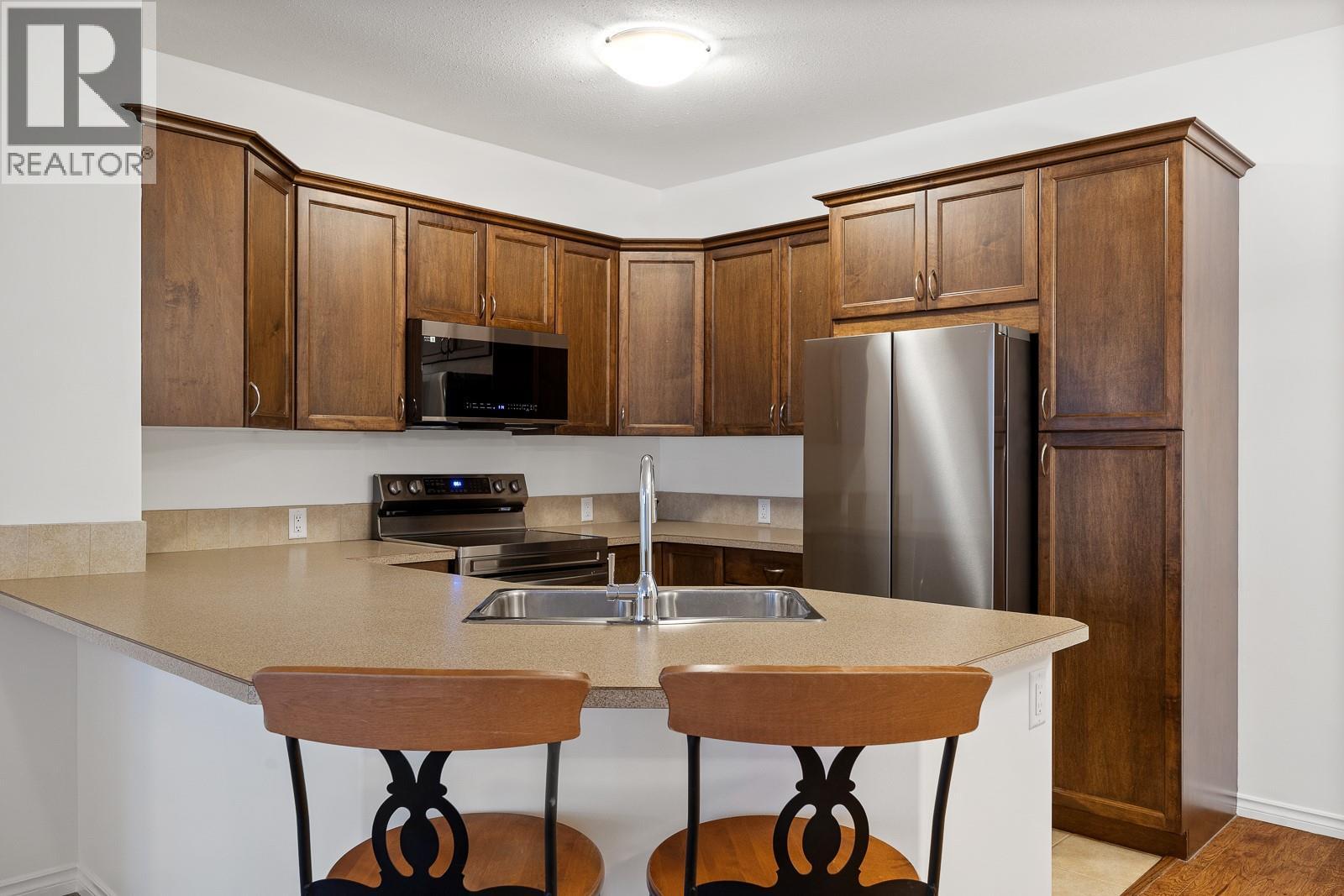 1007 Harvey Avenue Unit# 104, Kelowna, British Columbia  V1Y 6E4 - Photo 4 - 10380736