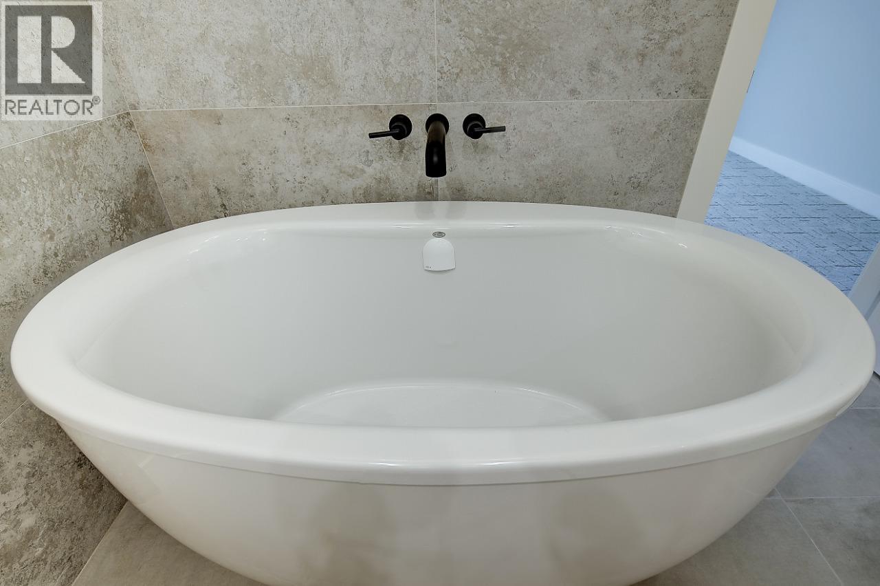 75 Predator Ridge Drive Unit# 205, Vernon, British Columbia  V1H 2H1 - Photo 25 - 10383415