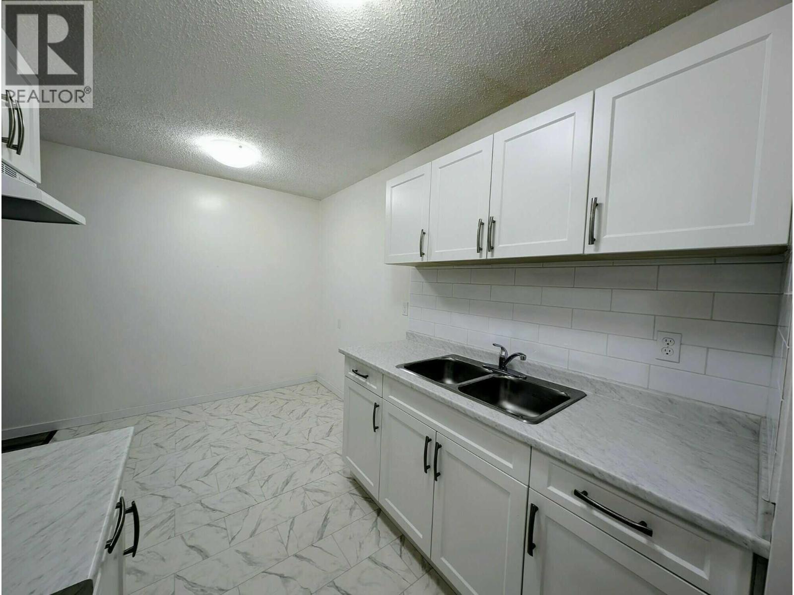 280 Alder Drive Unit# 103, Logan Lake, British Columbia  V0K 1W0 - Photo 4 - 10385534
