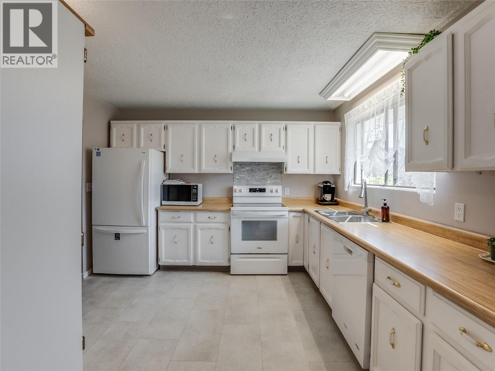 1937 Riverside Crescent, Castlegar, British Columbia  V1N 3W5 - Photo 4 - 10386371