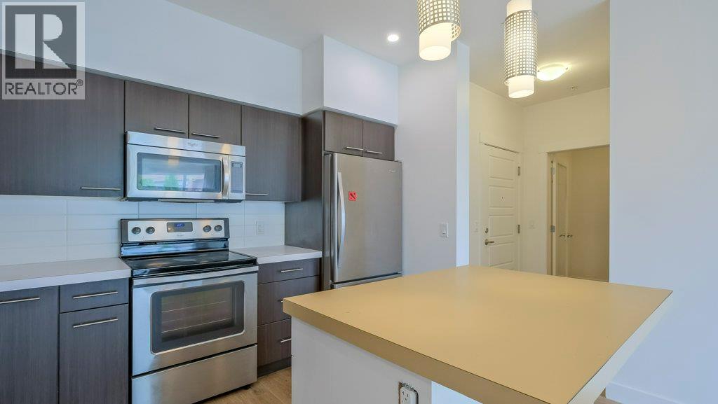 985 Academy Way Unit# 101, Kelowna, British Columbia  V1V 3C8 - Photo 2 - 10386654
