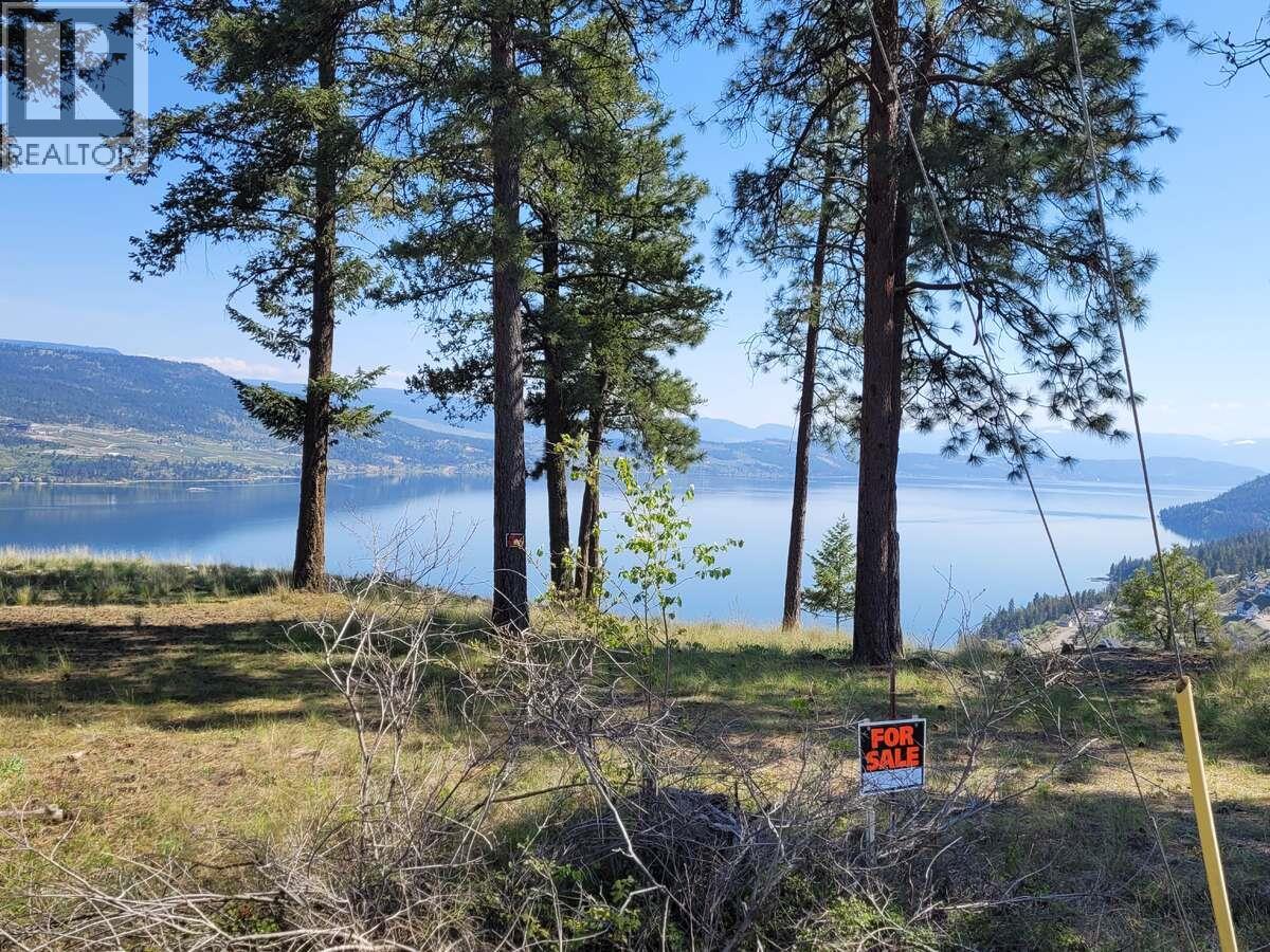 7185 Dunwaters Road, Kelowna, British Columbia  V1Z 3W5 - Photo 2 - 10390046
