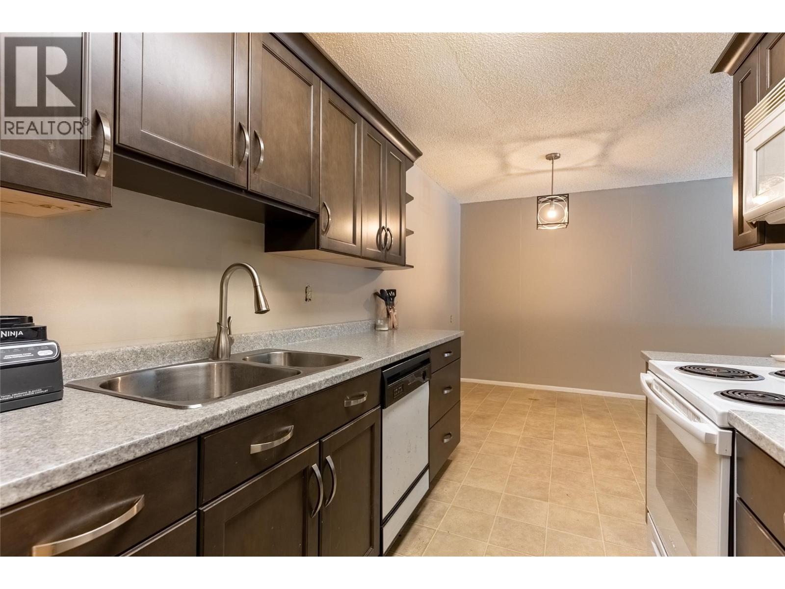 279 Alder Drive Unit# 101, Logan Lake, British Columbia  V0K 1W0 - Photo 1 - 10390383