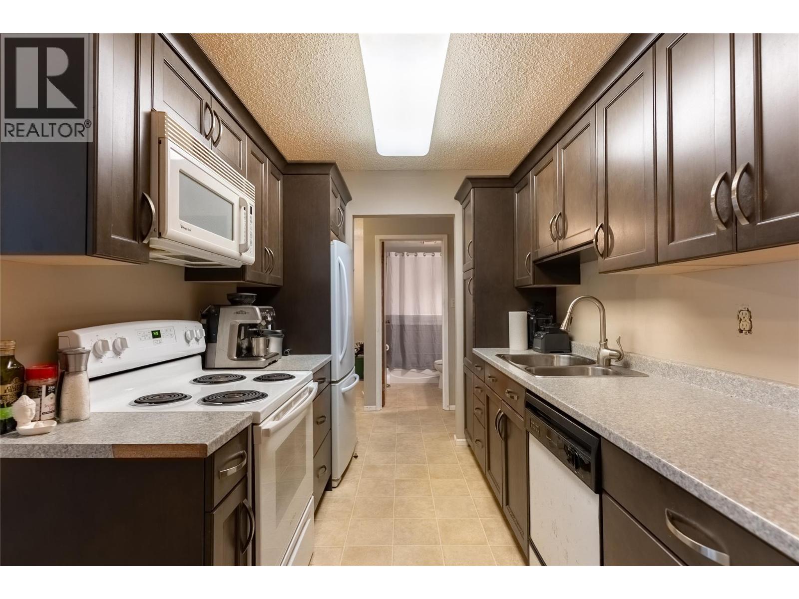 279 Alder Drive Unit# 101, Logan Lake, British Columbia  V0K 1W0 - Photo 2 - 10390383