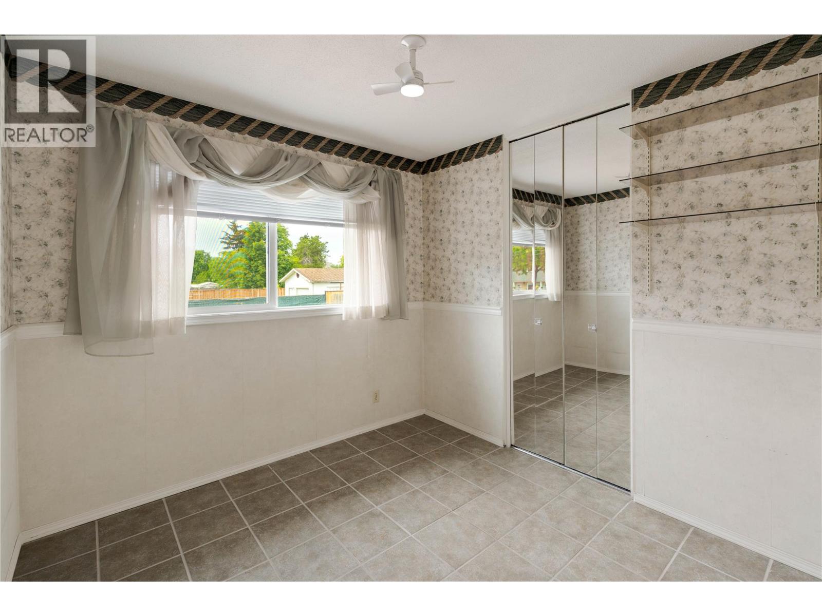 702 Hollydell Road, Kelowna, British Columbia  V1X 1L5 - Photo 10 - 10390712