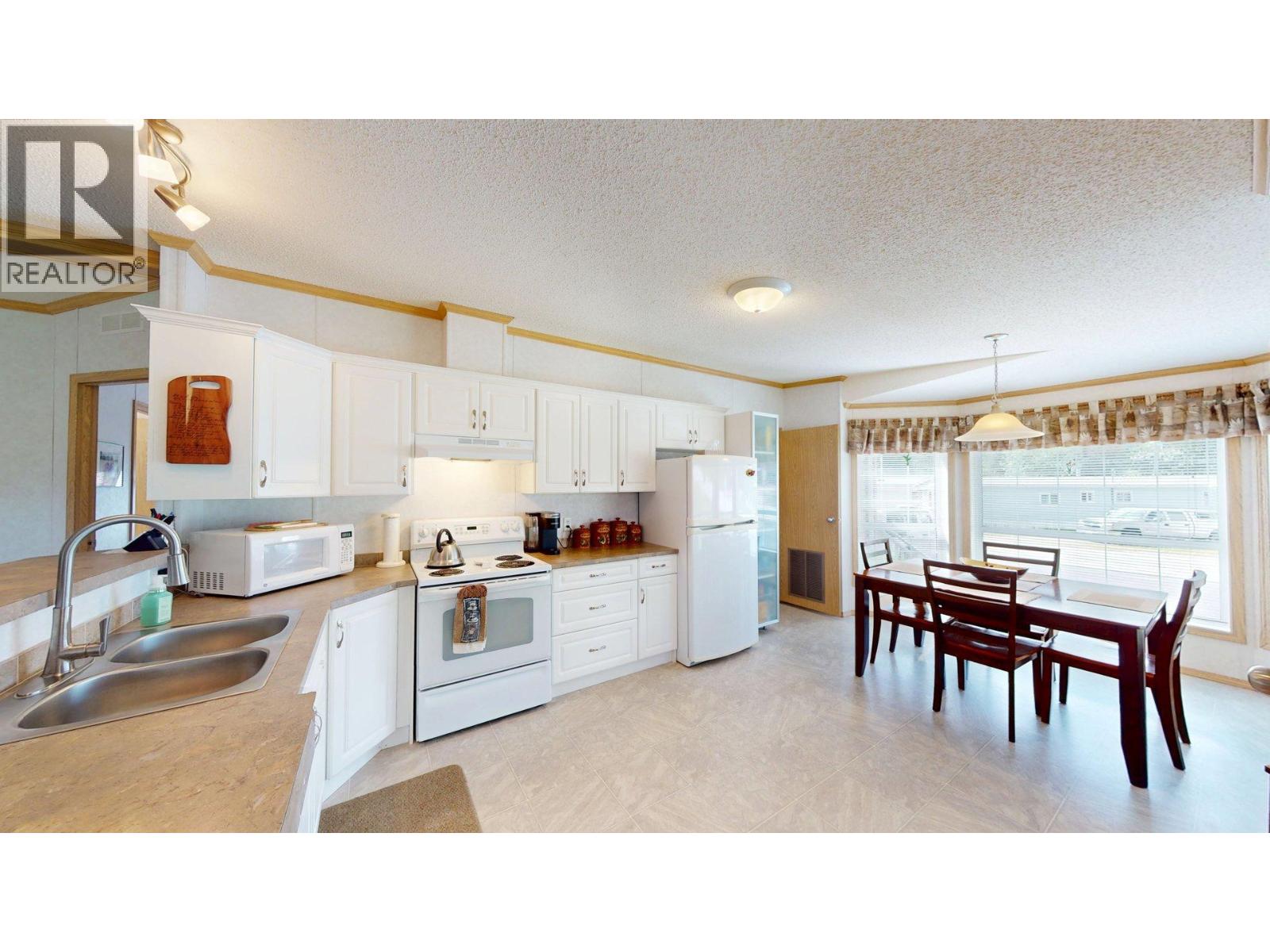 500 16th Avenue Unit# 50, Genelle, British Columbia  V0G 1G0 - Photo 5 - 10390359