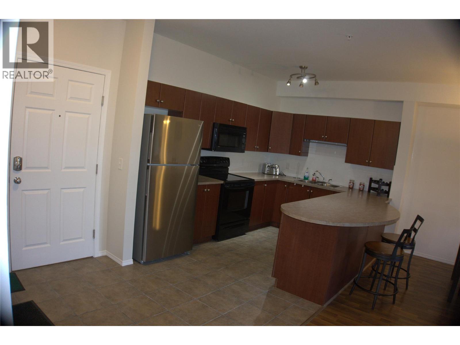 1875 Country Club Drive Unit# 1318, Kelowna, British Columbia  V1V 2W7 - Photo 2 - 10392022