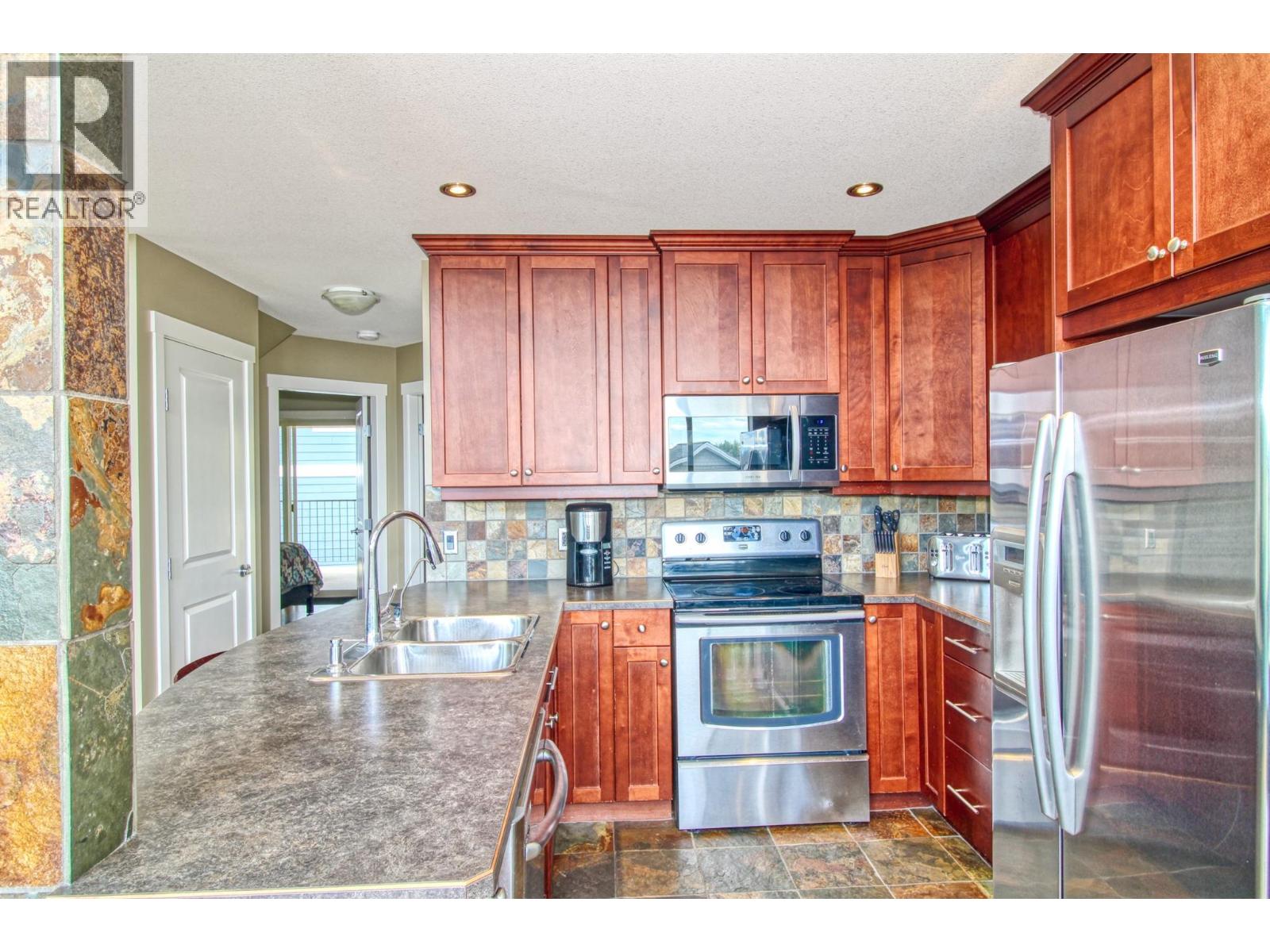 6834 Madrid Way Unit# 316, Kelowna, British Columbia  V1Z 3R8 - Photo 21 - 10392093