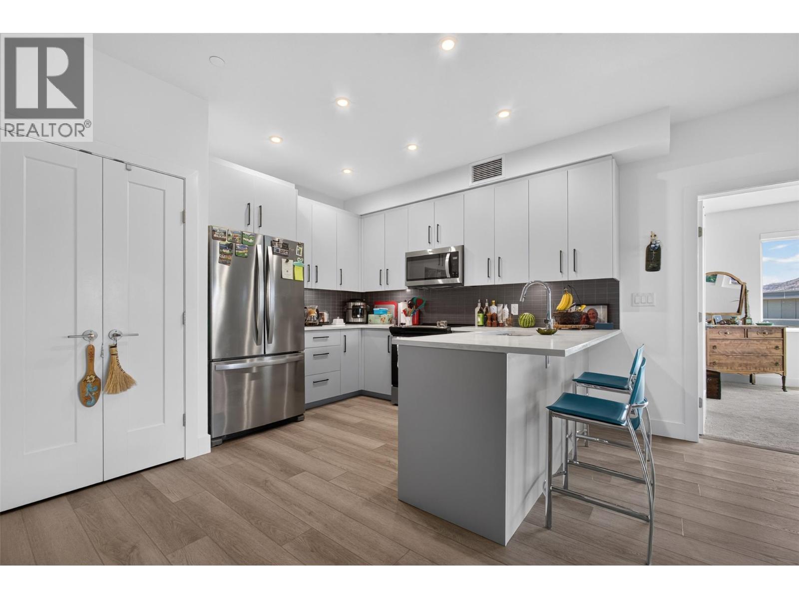 3434 Mckinley Beach Drive Unit# 101, Kelowna, British Columbia  V1V 0H3 - Photo 3 - 10391827