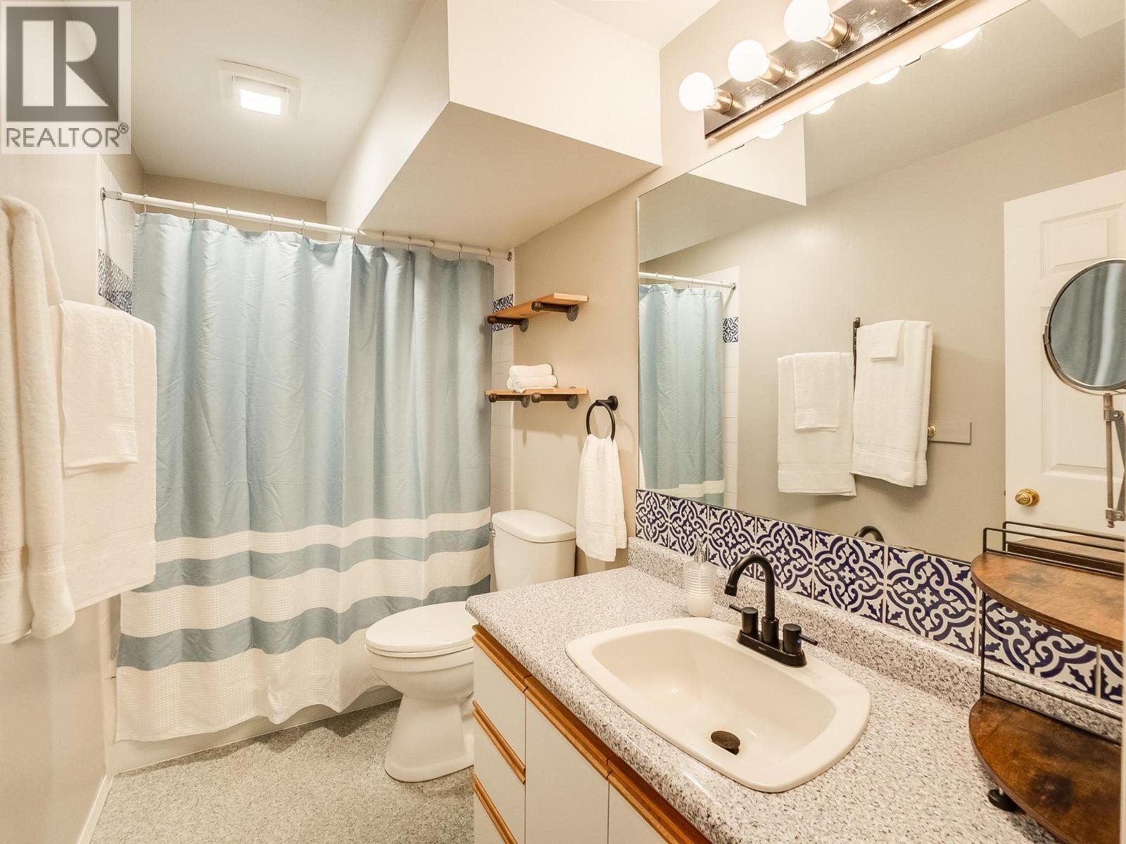 5648 Longbeach Road, Nelson, British Columbia  V1L 6N9 - Photo 15 - 10393326