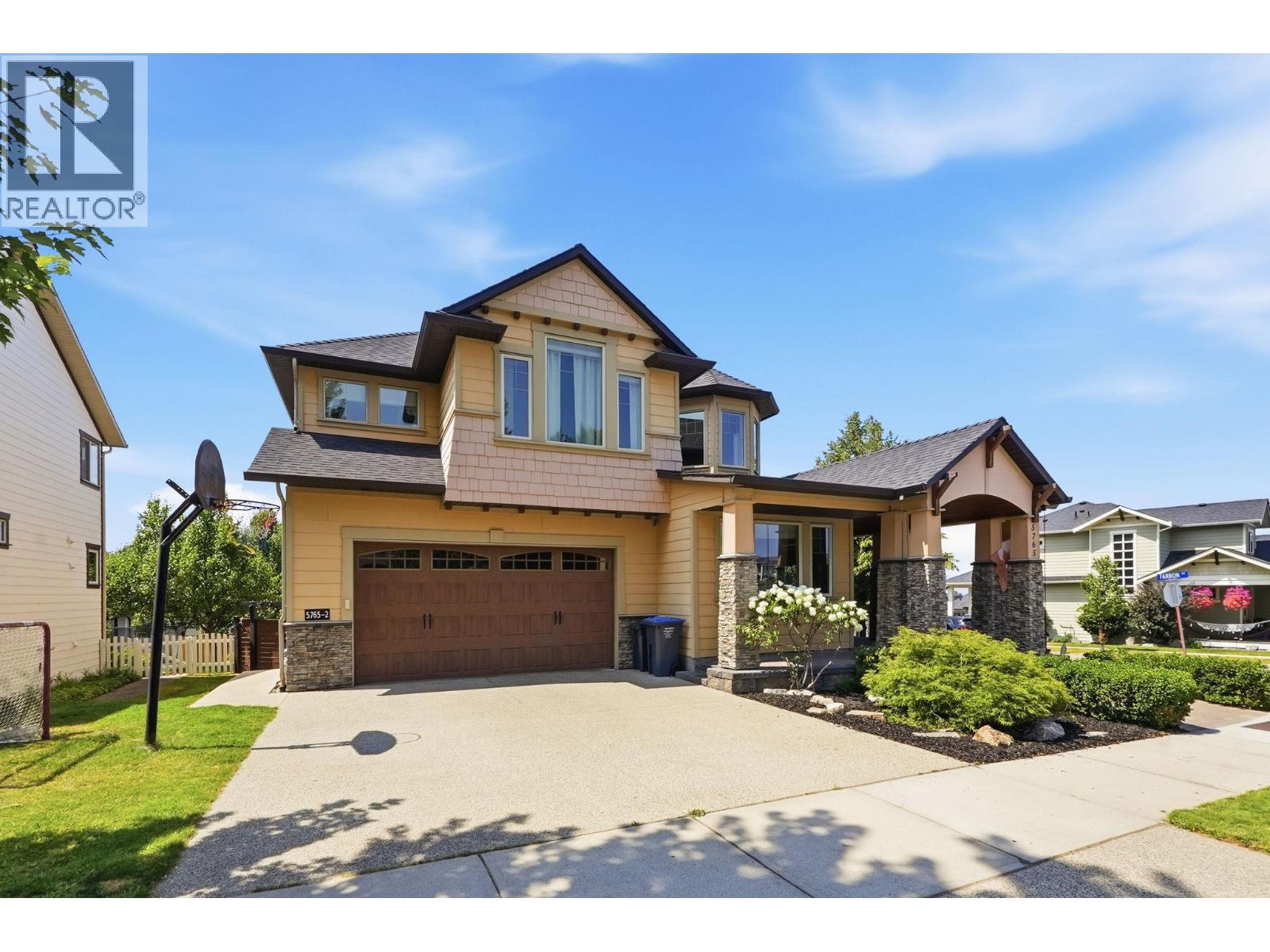5765 Mountainside Drive, Kelowna, British Columbia  V1W 5H2 - Photo 3 - 10396052