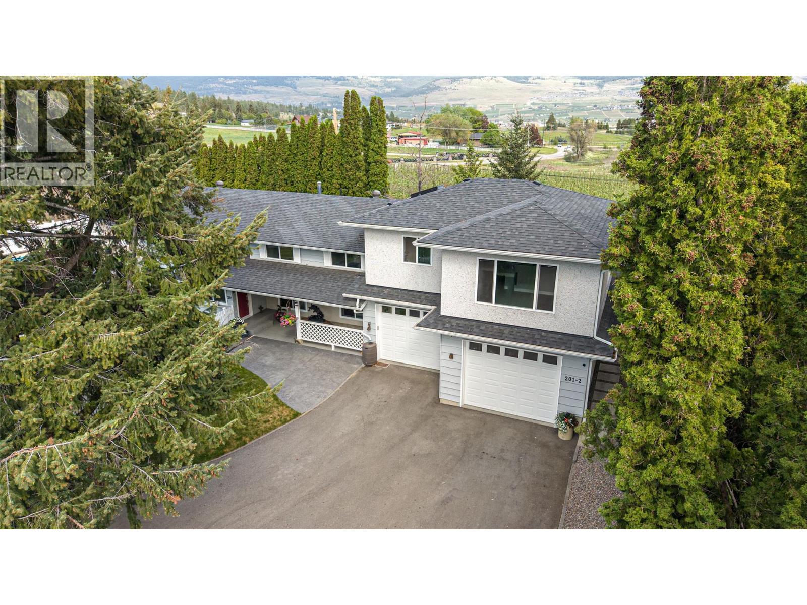 201 Mail Road, Kelowna, British Columbia  V1V 2G6 - Photo 1 - 10397487