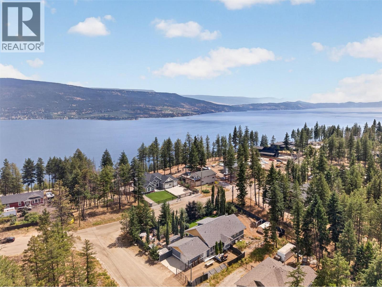 7272 Dunwaters Road, Kelowna, British Columbia  V1Z 3W4 - Photo 1 - 10395772