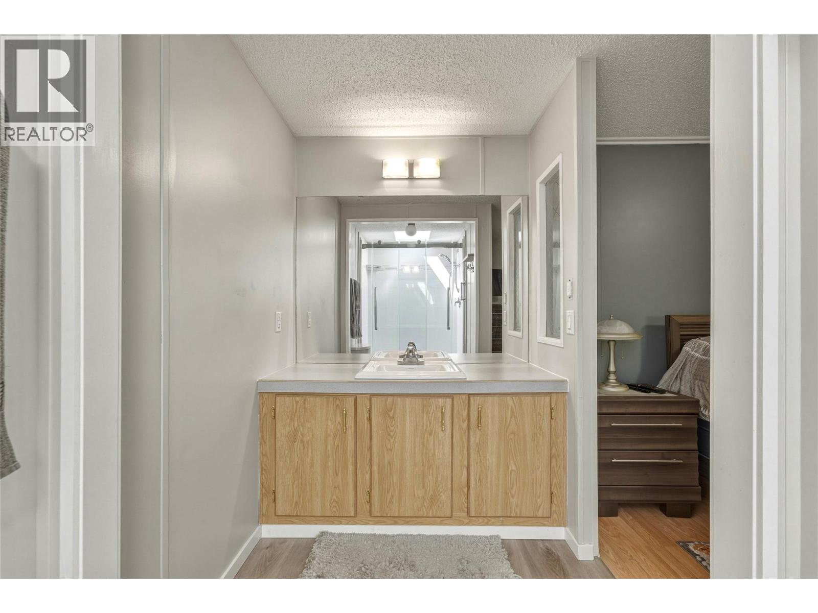 6710 Tronson Road Unit# #214, Vernon, British Columbia  V1H 1X6 - Photo 24 - 10398407