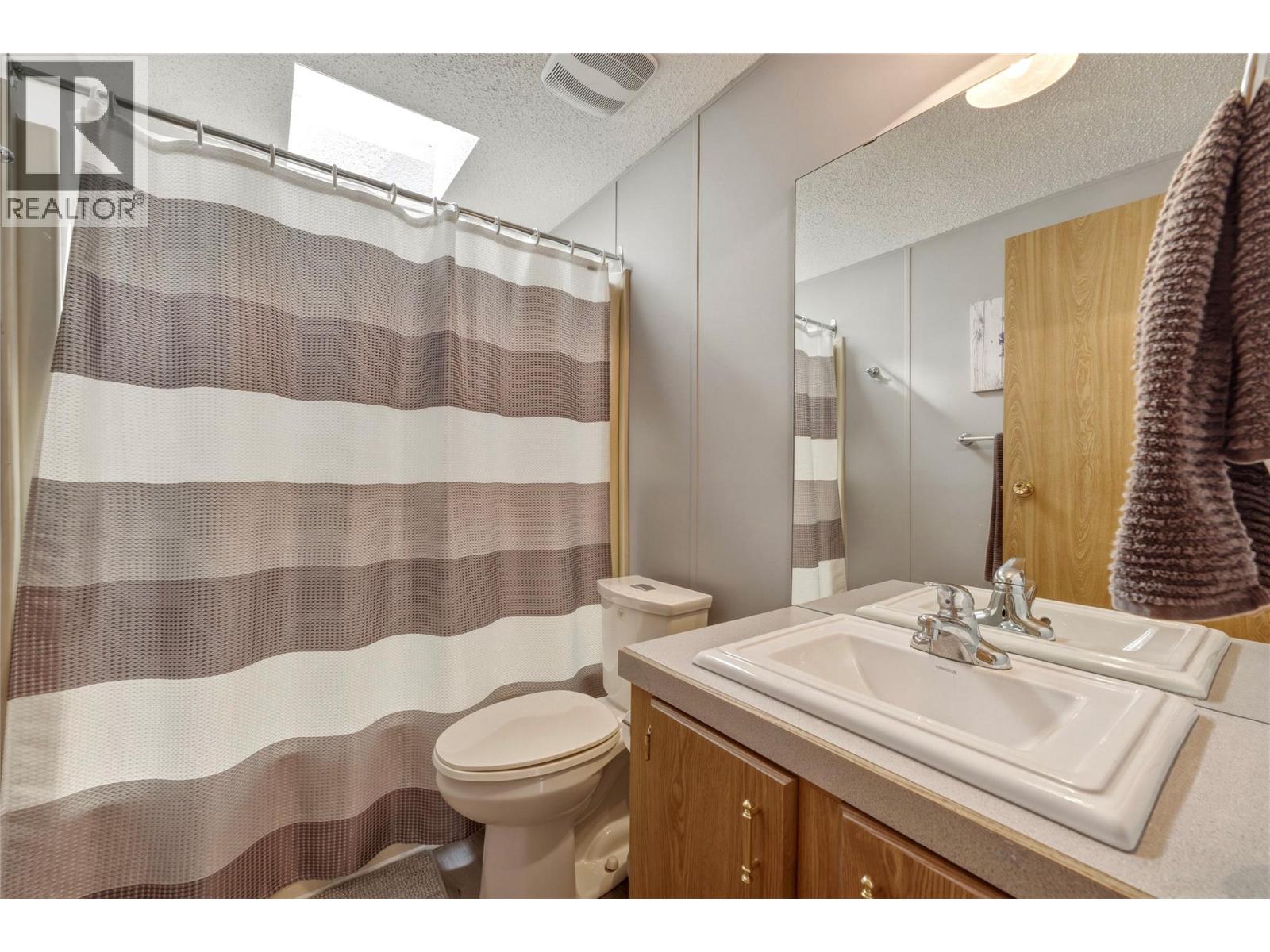 6710 Tronson Road Unit# #214, Vernon, British Columbia  V1H 1X6 - Photo 26 - 10398407