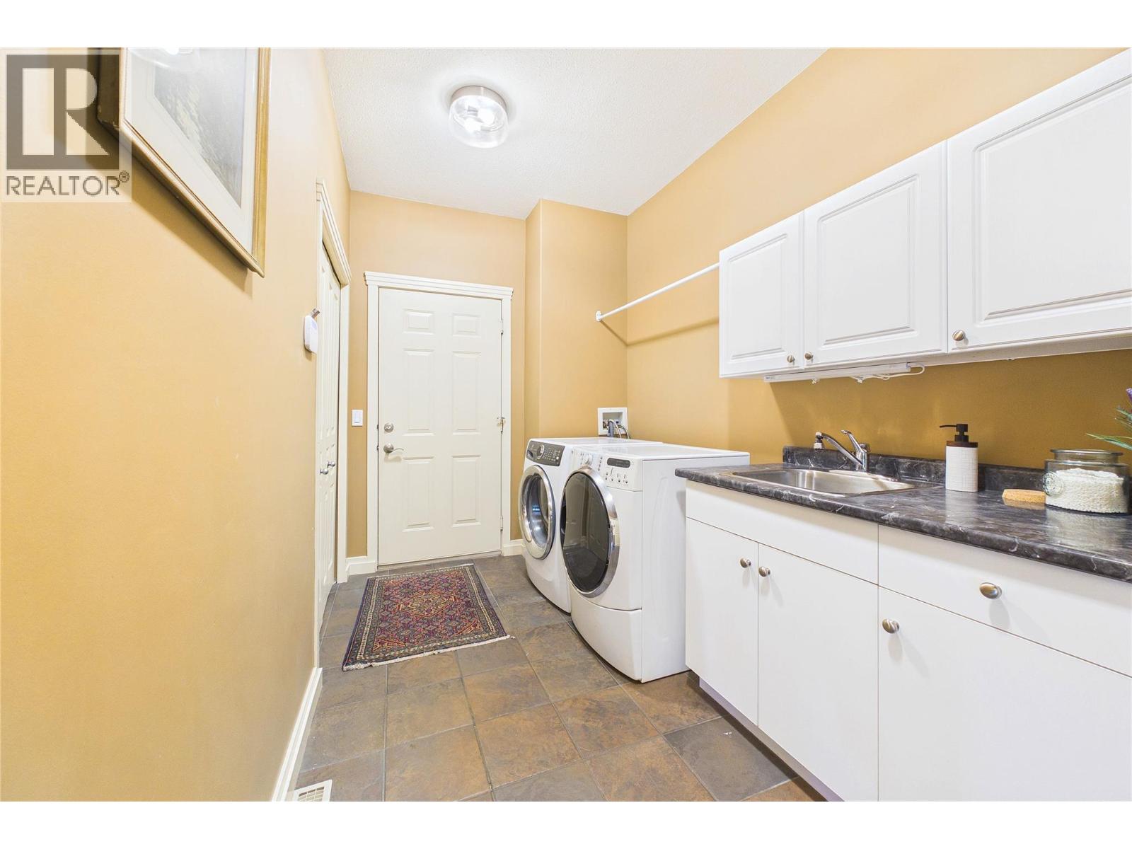 1950 Capistrano Drive Unit# 108, Kelowna, British Columbia  V1V 2N7 - Photo 34 - 10401392