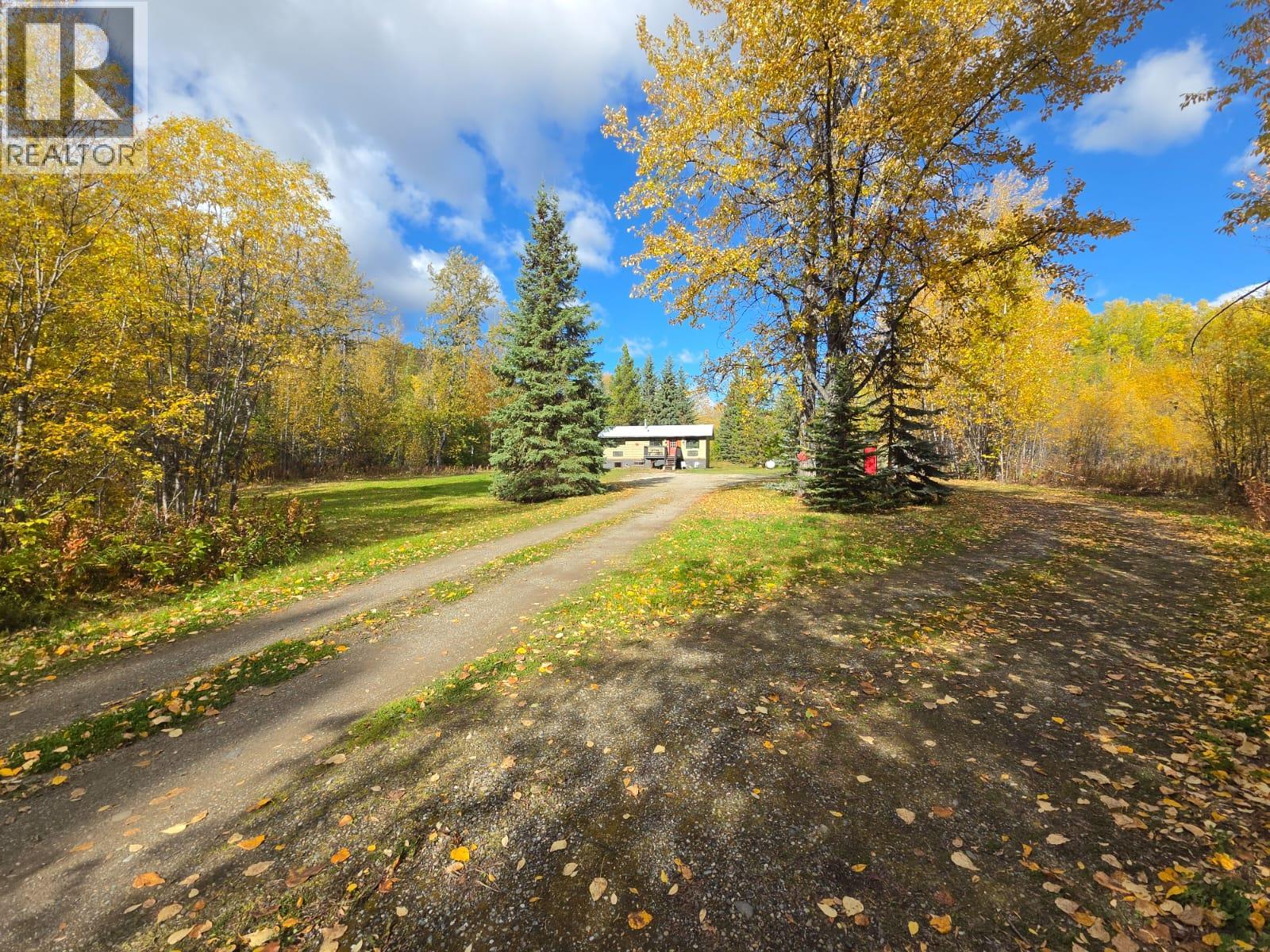 6082 Centennial Road W, Moberly Lake, British Columbia  V0C 1X0 - Photo 1 - 10402361
