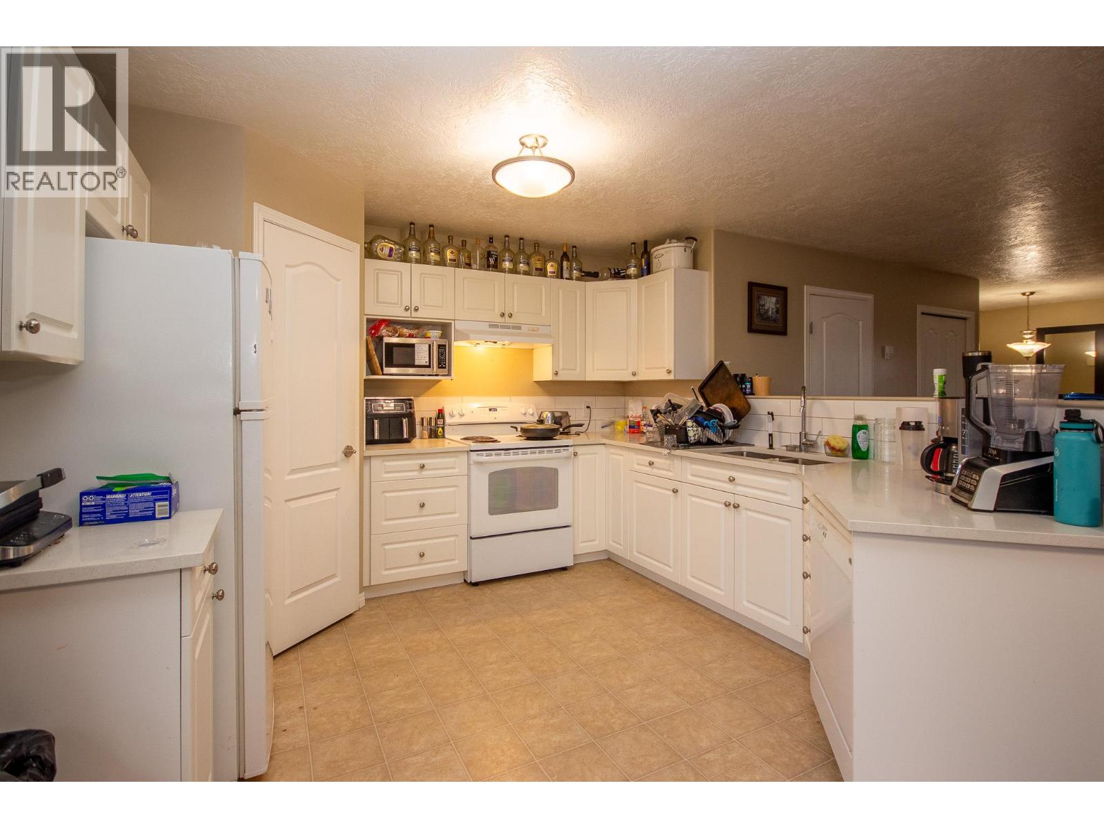 1637 100 Avenue, Dawson Creek, British Columbia  V1G 1X3 - Photo 2 - 10403058