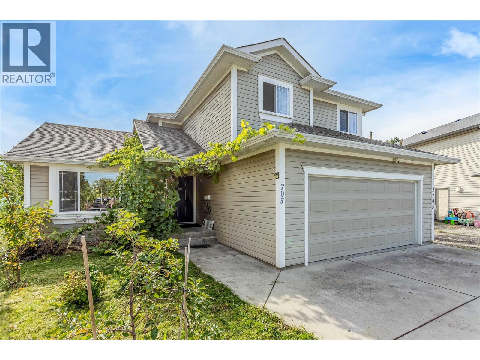 705 Stoltz Court, Kelowna, British Columbia  V1X 7X7 - Photo 2 - 10402852