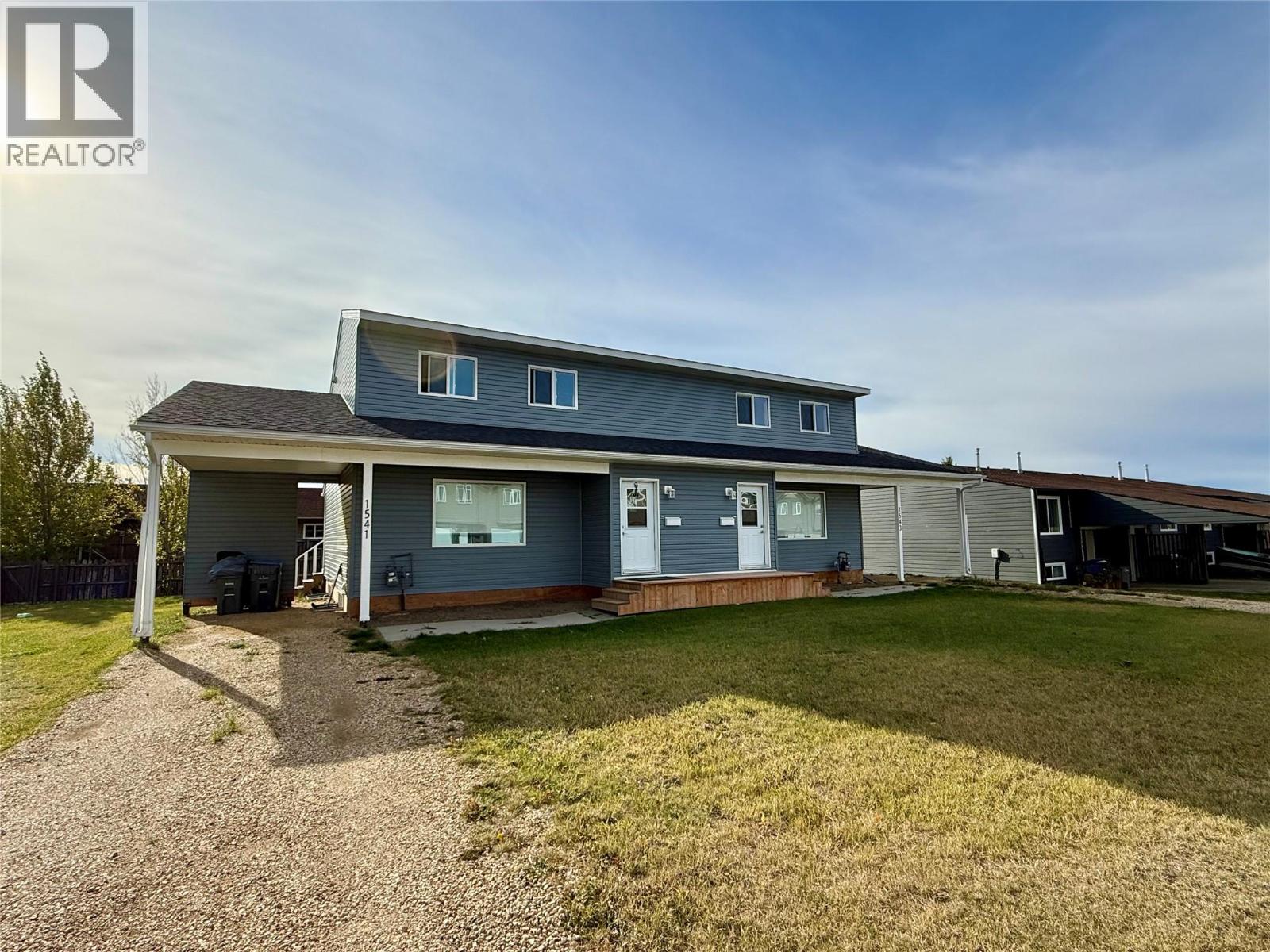 1541 / 1543 Loran Drive, Dawson Creek, British Columbia  V1G 1B7 - Photo 1 - 10403347