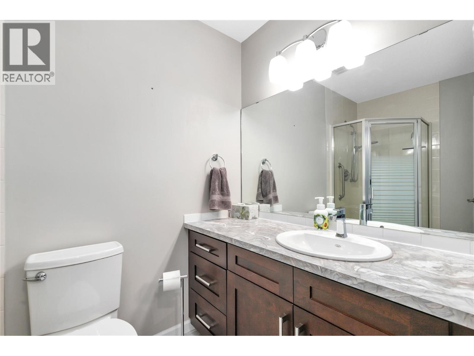 1329 Klo Road Unit# 404, Kelowna, British Columbia  V1W 3N9 - Photo 24 - 10403261